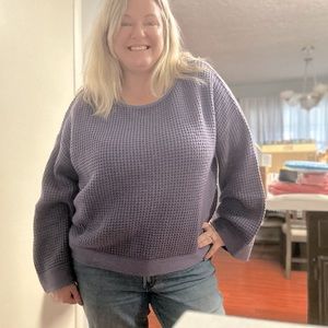 Boutique sweater with bell sleeves
